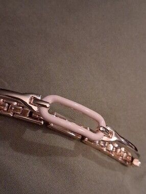 Anne Klein Gold Tone Bracelet with Light Pink Enamel Link